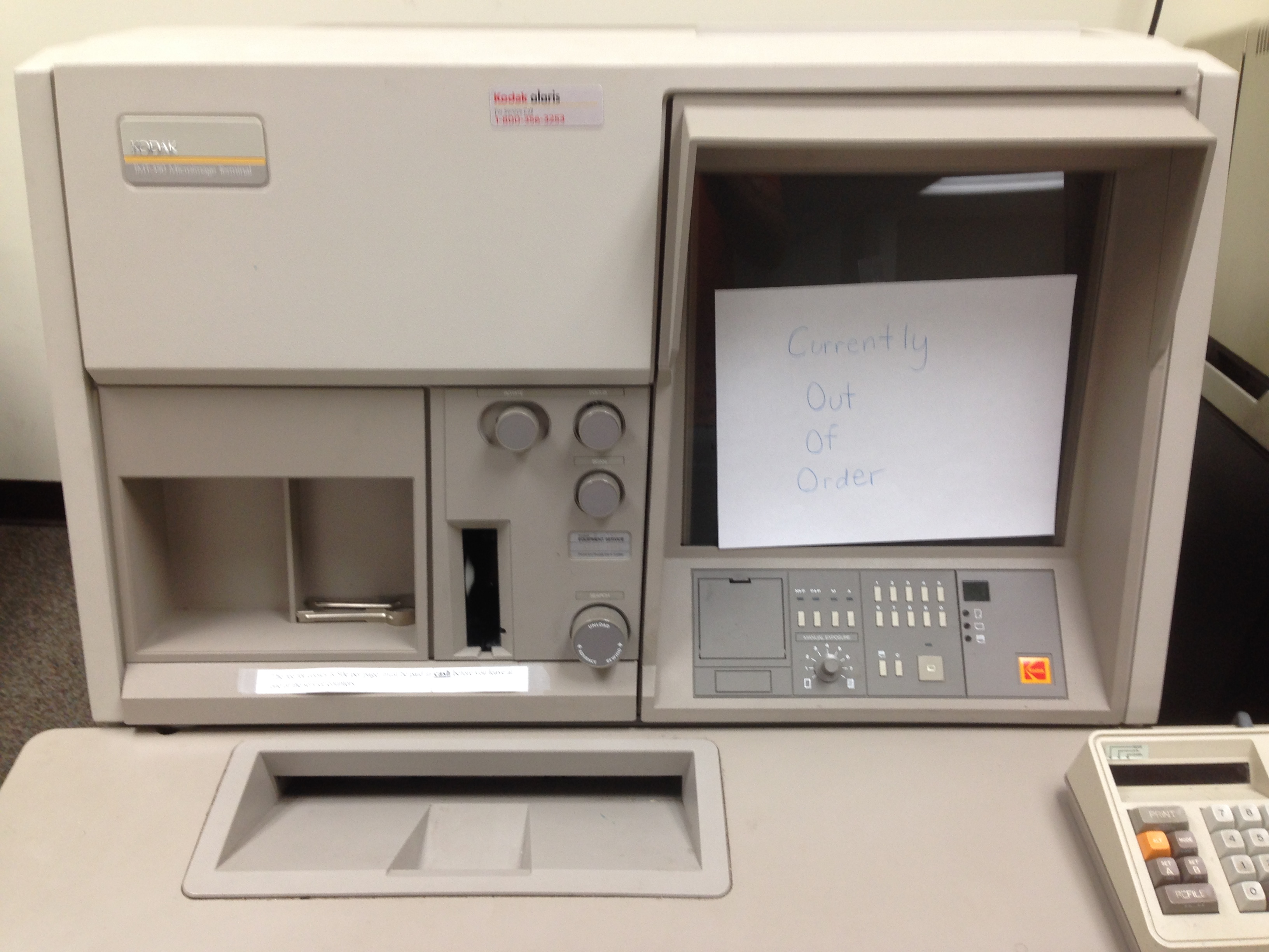 Image of Microfilm Reader with out-of-order sign